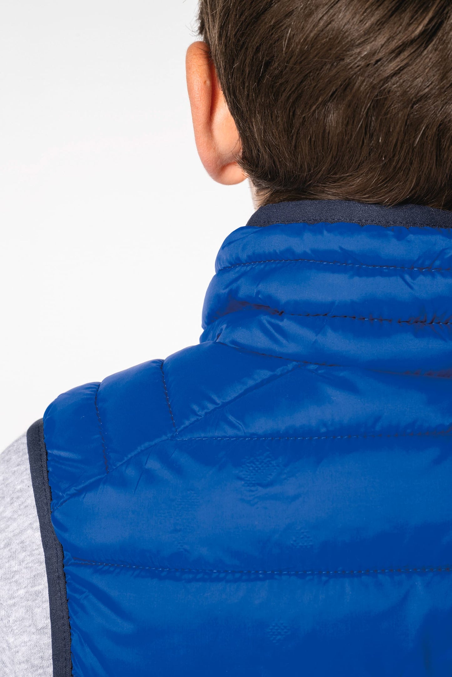 K6115 - Piumino bambino leggero smanicato