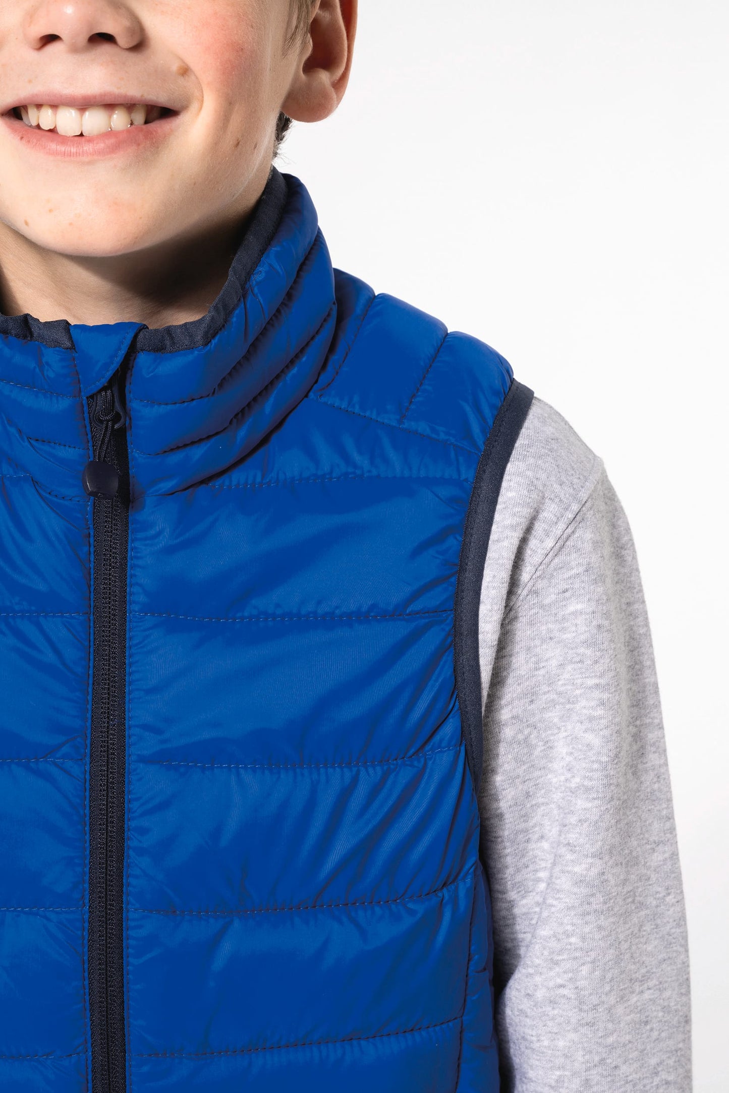 K6115 - Piumino bambino leggero smanicato