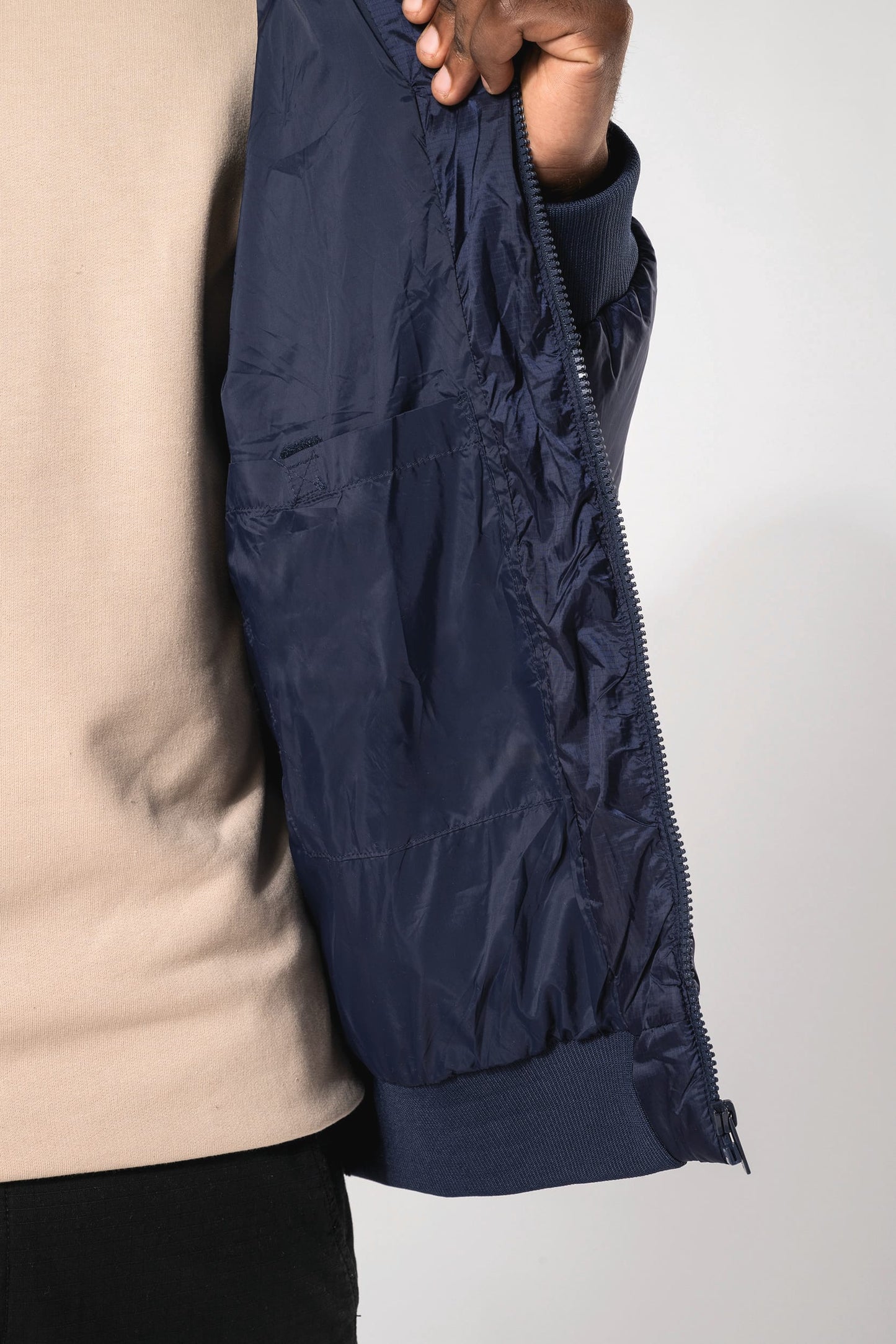 K6166 - Giacca unisex ripstop riciclato con cappuccio