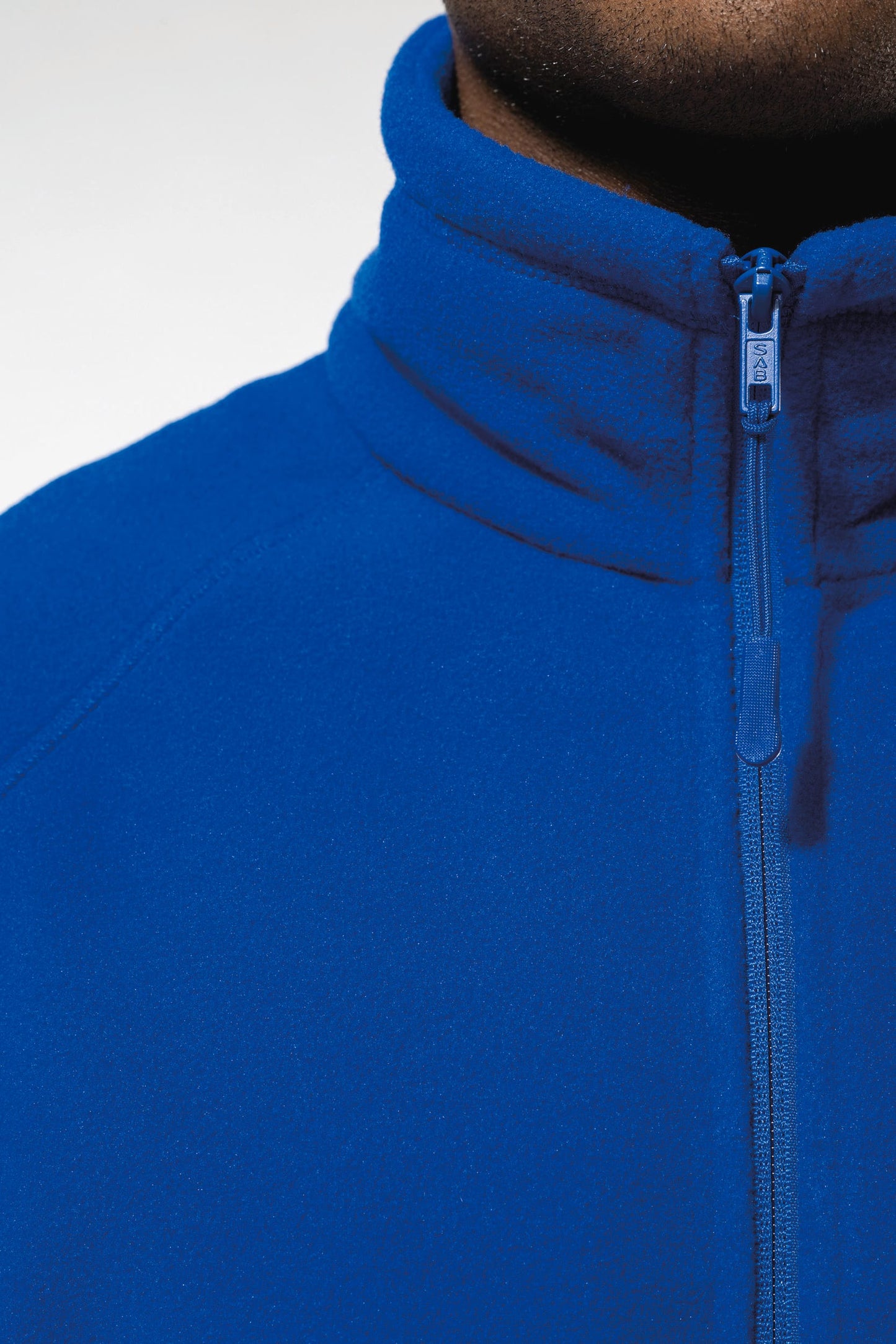 K917 - Giacca micropile con zip manica raglan uomo